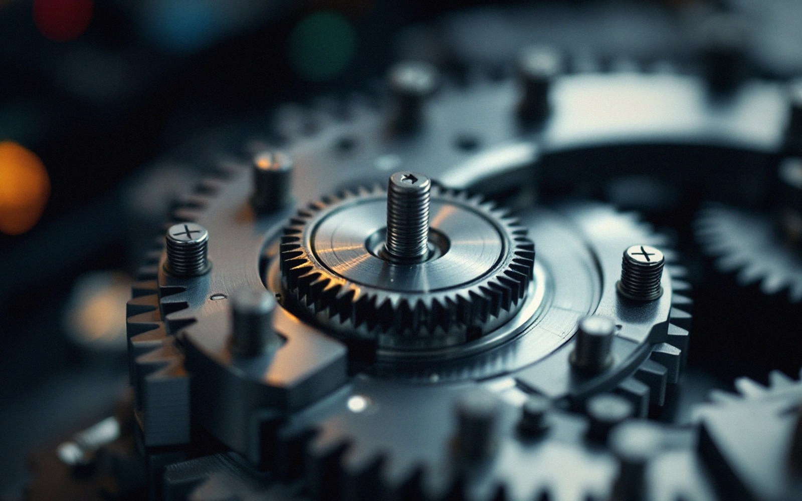 A cut bimetallic balance wheel with timing screws around the rim, macro, dark ground